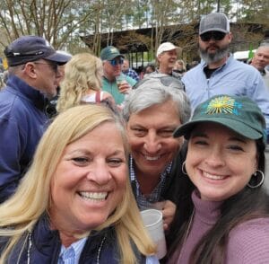 People smiling at an event